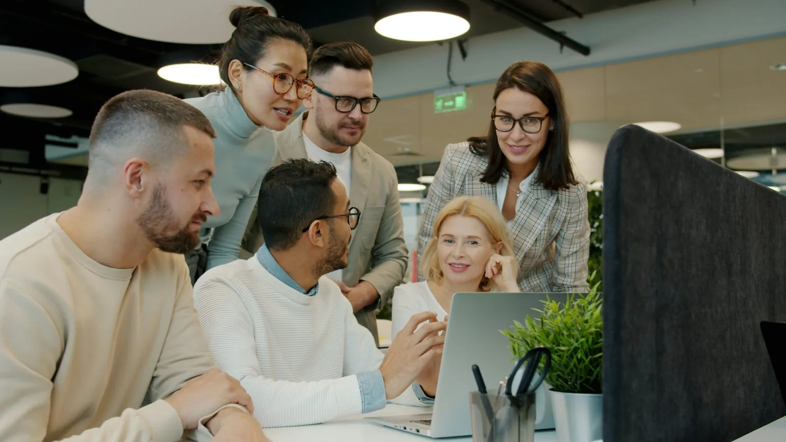 A professional team working together in a modern office